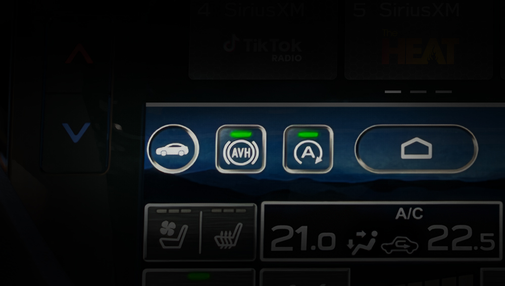 Plan rapproché du bouton de la fonction de retenue automatique du véhicule.