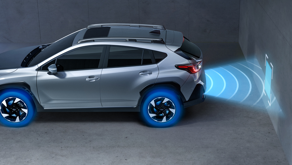 Illustration du fonctionnement du freinage automatique en marche arrière.