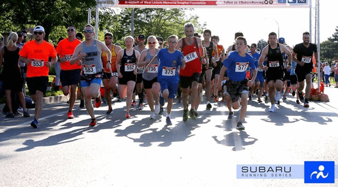 Image of running competitors at the starting line.