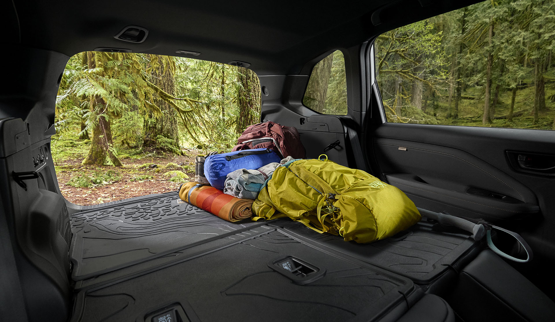 Cargo area of the Subaru Forester Wilderness with camping baggage.