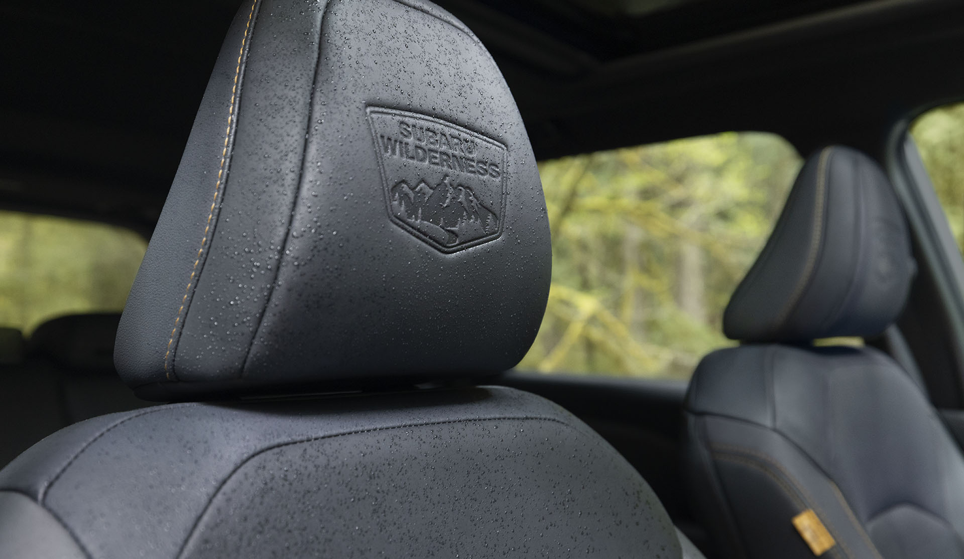 Closeup shot of the 2026 Subaru Forester Wilderness front seat headrest with Wilderness logo.